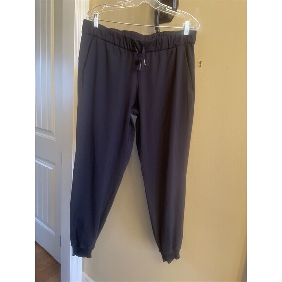 Lululemon On The Fly Jogger Luxtreme Women’s Drawstring Pants Black Size 12 - Picture 1 of 15